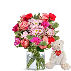 Beautiful pink flowers with teddybear