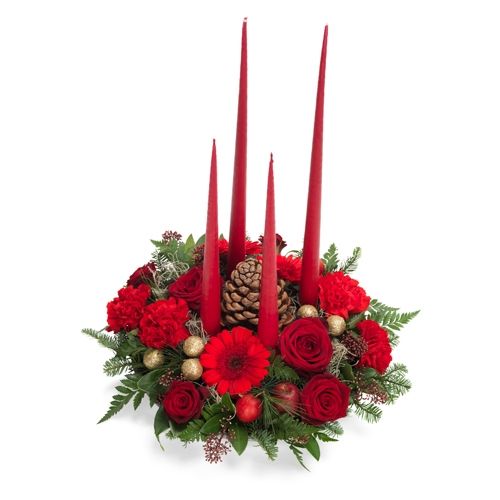Christmas arrangement with four thin red candles