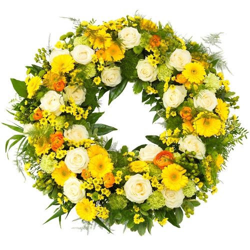 Yellow funeral wreath with green delivered in Holland Regiobloemist