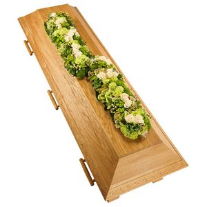 White and green funeral arrangement