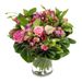 Pink bouquet with various types of green