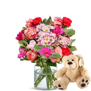 Beautiful pink flowers with teddybear